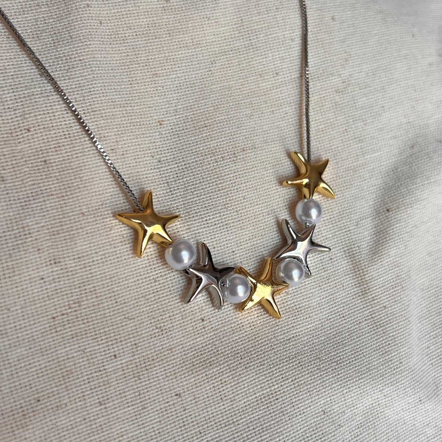 Collar plateado estrellas mix con perla
