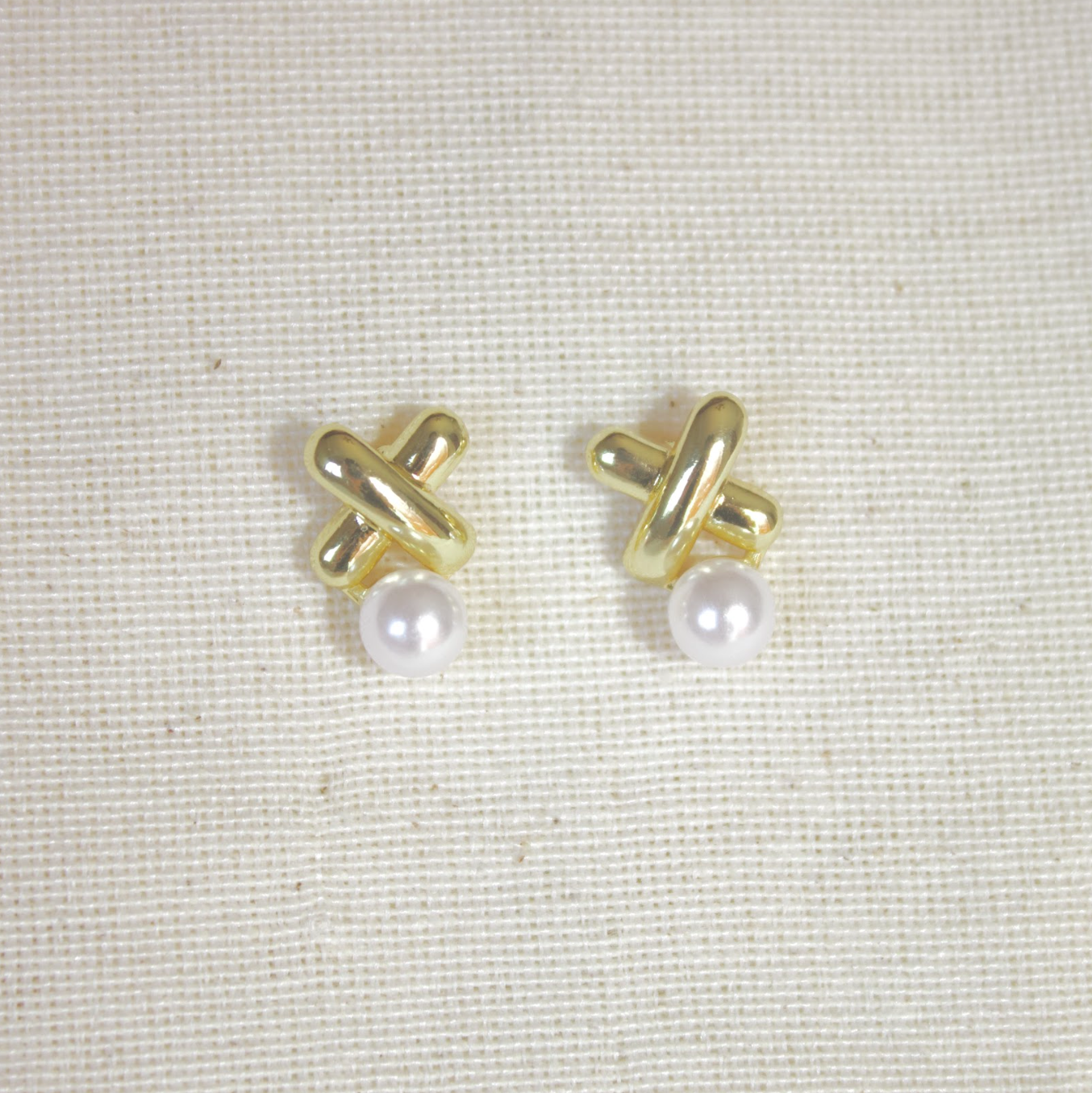 Aretes X con perla