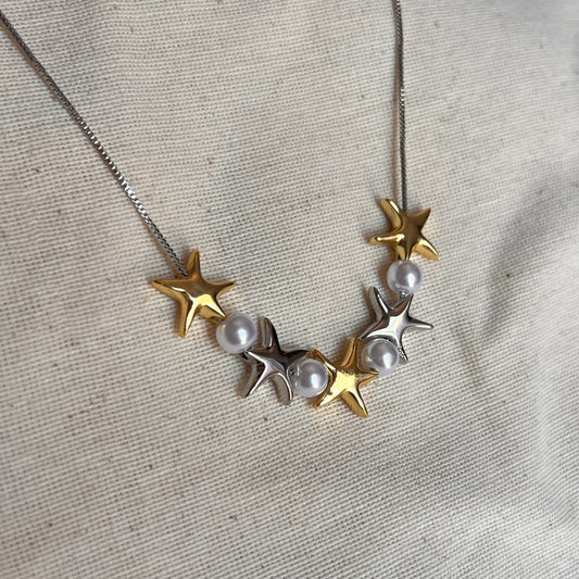 Collar plateado estrellas mix con perla