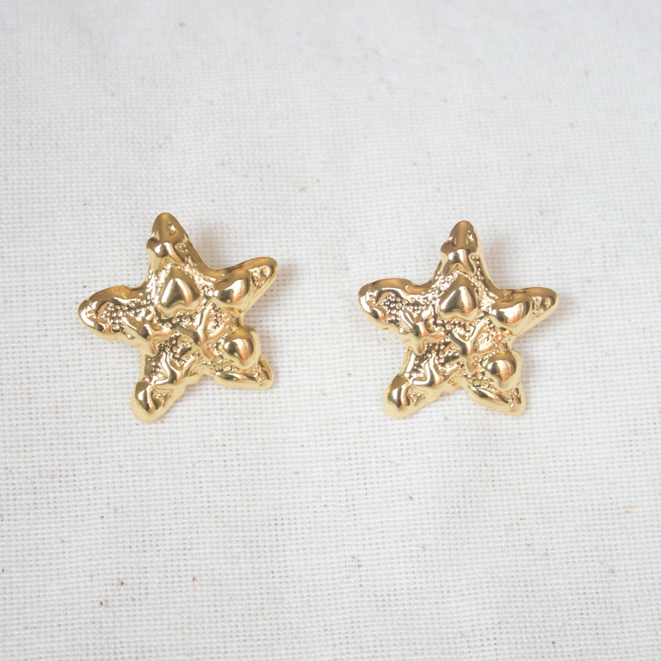 Aretes estrella irregular