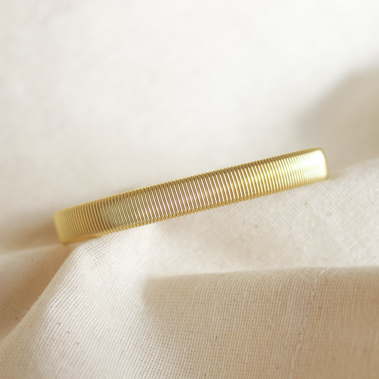 Brazalete rigido dorado