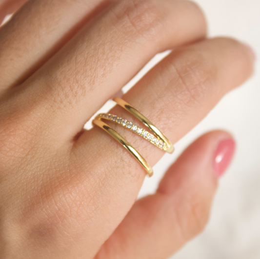Anillo tres lineas una con circonia
