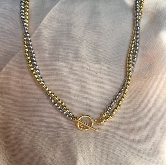 Collar doble torcido